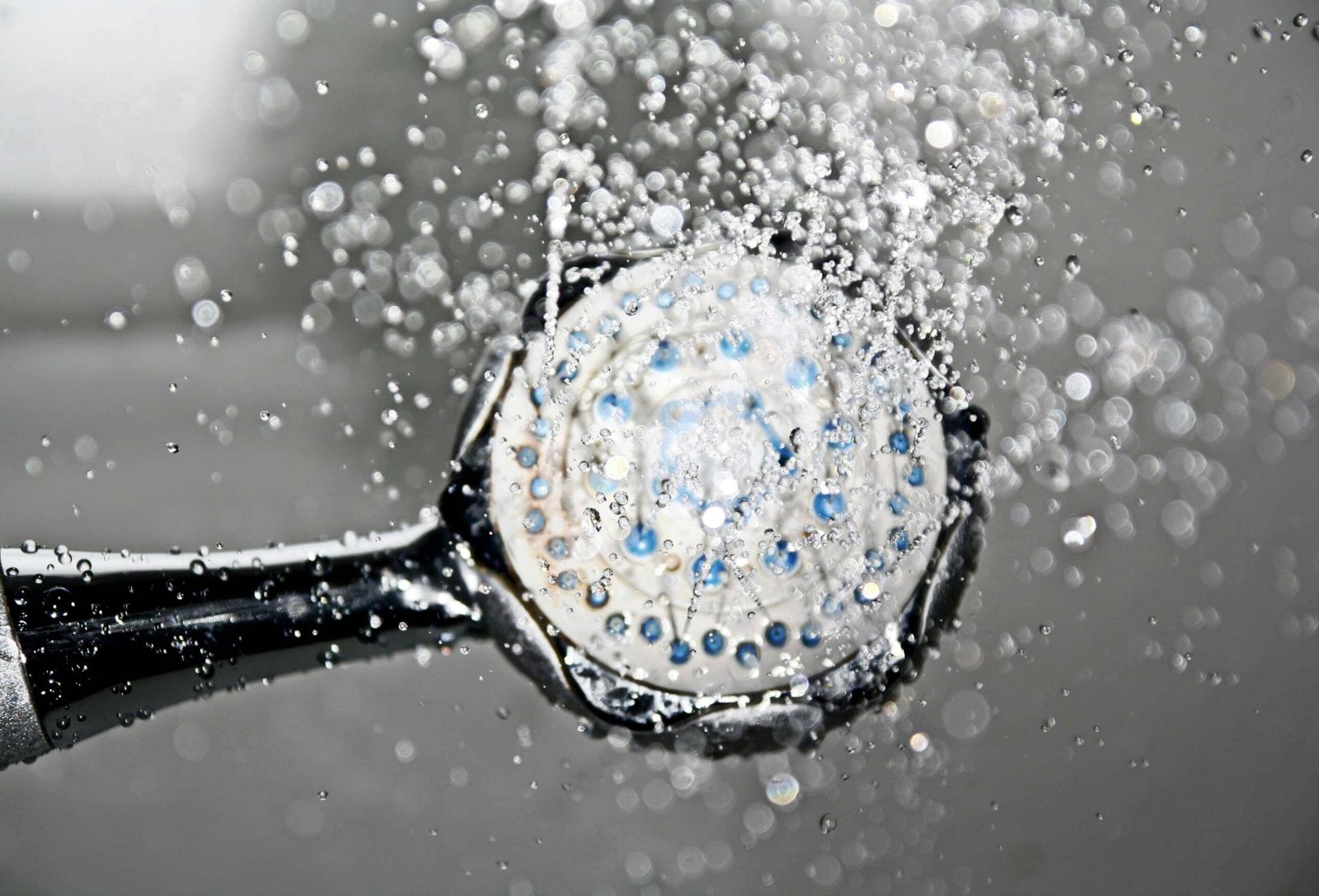 Shower head running with water