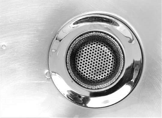 Residential Plumbing Services In Gresham WA – Sound Plumbing & Drain Silver plug hole in sink.