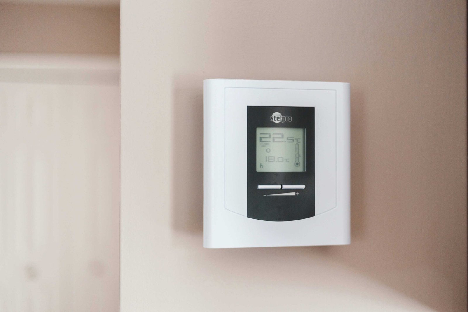 Water-Heater repair-and installation-rainier-OR-Sound-Plumbing-and-Drain Smart thermostat on wall.